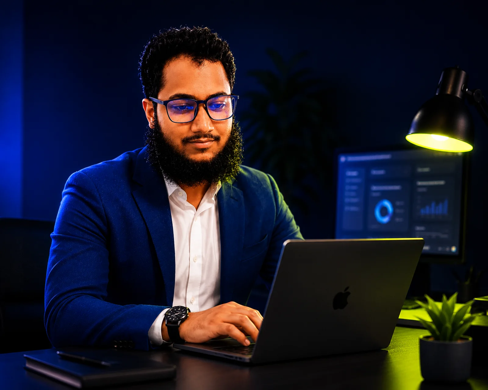 Ashikur Rahman, founder of Hey Ash, at his desk